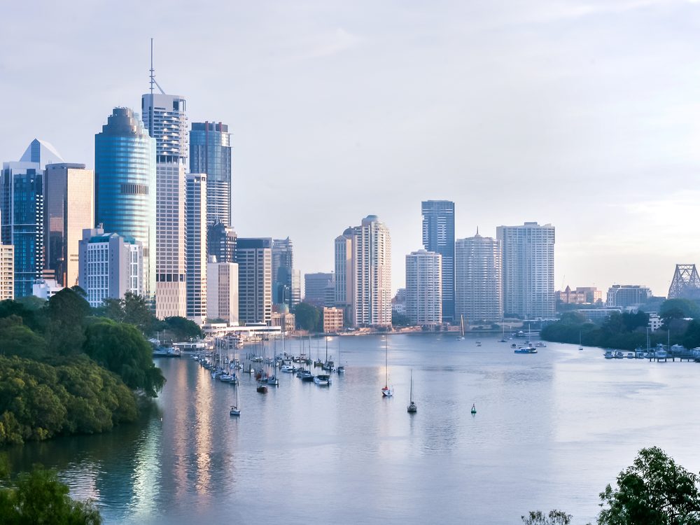 The Brisbane skyline and river at dusk